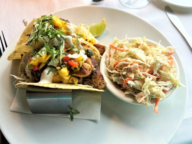 Blackened Mahi Tacos are on the lunch menu at Kyle G's Prime Seafood & Steaks and are a delicious combination of spicy fish, crunchy cabbage, and tangy lime crema.