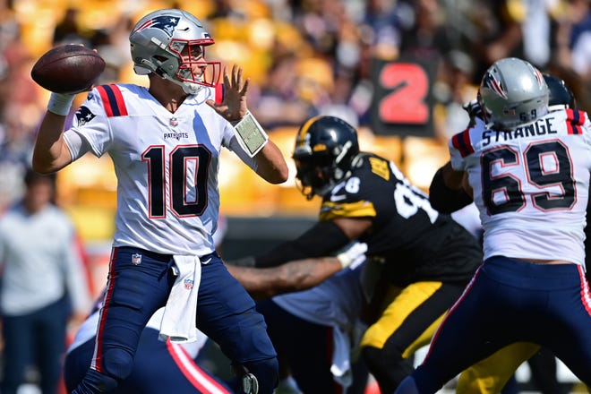 Sep 18, 2022; Pittsburgh, Pennsylvania, USA; New England Patriots quarterback Mac Jones (10) throws a pass during the third quarter against the Pittsburgh Steelers at Acrisure Stadium. Mandatory Credit: David Dermer-USA TODAY Sports