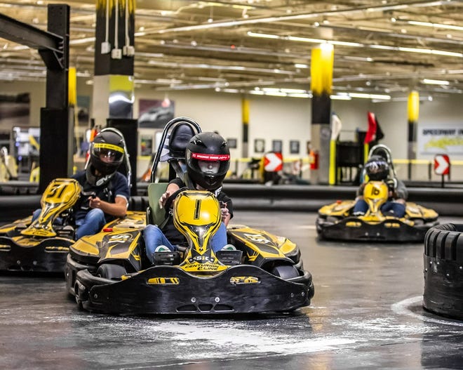 People race around the Speedway Indoor Karting facility in Daytona Beach. SPEEDWAY INDOOR KARTING/CONTRIBUTED