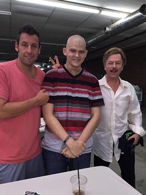 Adam Sandler, left, Gaige Robbins and David Spade hang out on the set of Sandler and Spade's latest comedy, "The Do Over," Monday in Georgia.