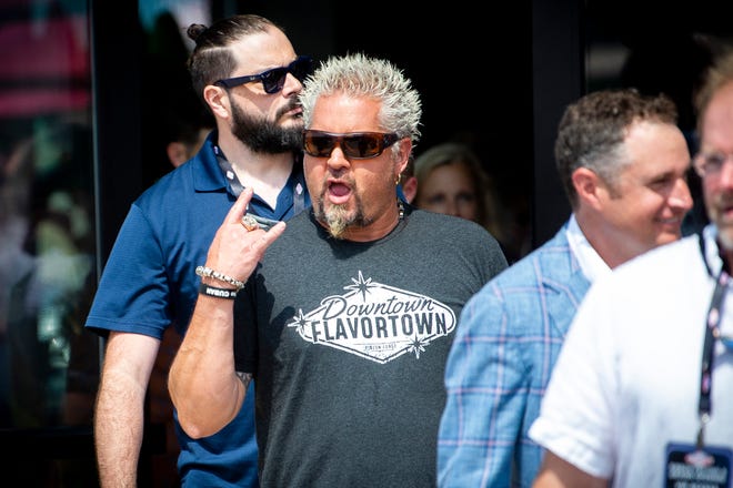 Guy Fieri during a grand opening event for Fieri's Downtown Flavortown in Pigeon Forge, Tennessee, on June 13, 2022. Later the same month, Fieri visited multiple restaurants in Volusia County for upcoming episodes of his hit Food Network show "Diners, Drive-Ins and Dives."