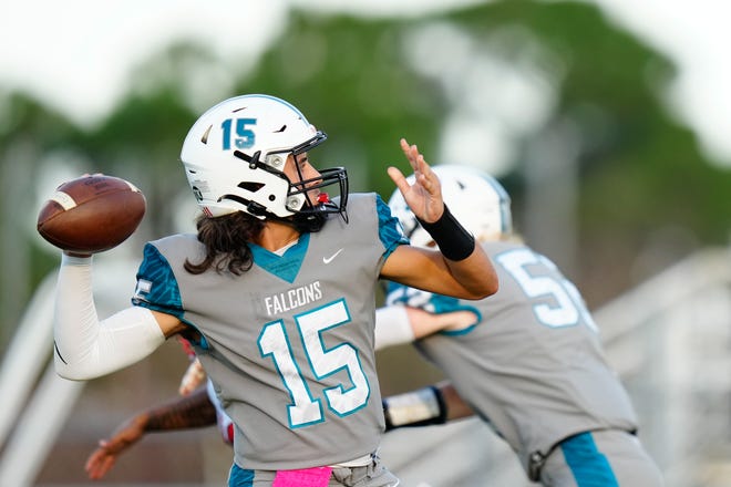 Jensen Beach High School’s quarterback Gio Cascione (15) throws the ball against Port St. Lucie High School in a high school football game on Monday, Oct. 3, 2022 at Jensen Beach High School. Jensen Beach won 28-0.