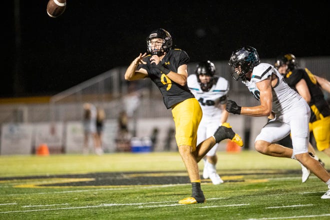 Carter Smith, the quarterback for Bishop Verot throws the ball for yards against Gulf Coast High School at Bishop Verot on Friday, Sept. 16, 2022. Bishop Verot won.