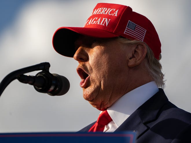 Rally goers, 45th President Donald Trump and Marco Rubio are seen at the Save America Rally at the Miami Dade County Fair and Expo in Miami on Sunday November 6, 2022.