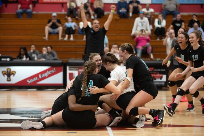 Jensen Beach celebrates their win over Barron Collier in the FHSAA Class 5A volleyball state championship on Saturday, Nov. 12, 2022, at Polk State College in Winter Haven.