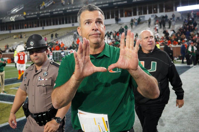 Nov 12, 2022; Atlanta, Georgia, USA; Miami Hurricanes head coach Mario Cristobal celebrates after a victory against the Georgia Tech Yellow Jackets at Bobby Dodd Stadium. Mandatory Credit: Brett Davis-USA TODAY Sports