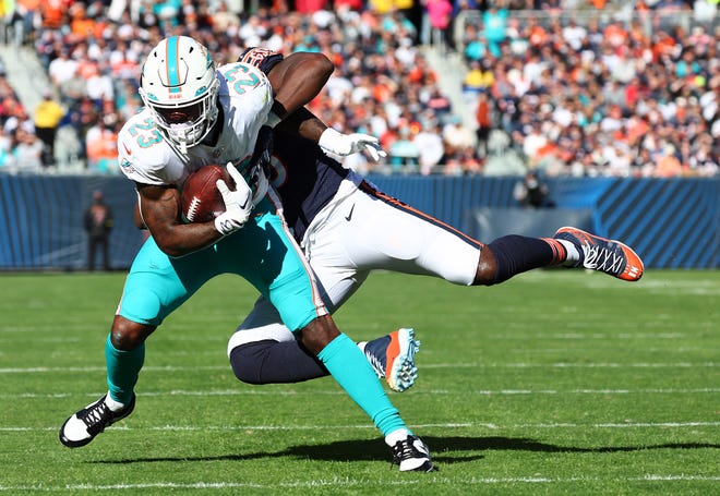 Running back Jeff Wilson made his Dolphins debut Sunday against the Bears and led the team with 51 yards rushing and also scored on a 10-yard reception.