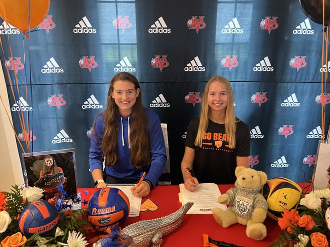 Vero Beach indoor volleyball standout Madison Gravlee and beach volleyball standout Katy Dalton signed their national letters of intent to play at Florida and Mercer in a ceremony with their family and friends on Wednesday, November 9, 2022 on Signing Day.
