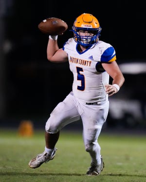 Martin County’s quarterback Pauly Boisvert (5) throws a pass against Jensen Beach in a high school football game on Thursday, Nov. 3, 2022, at Jensen Beach High School.