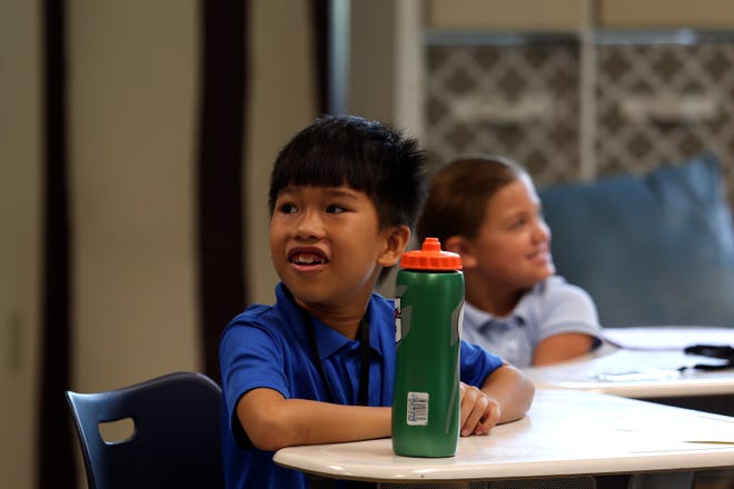 Staff from Vero Beach Elementary School welcomes students back for the first day of school on Wednesday, Aug. 10, 2022. Students returned from summer break to fully in-person classes with no mask mandate.