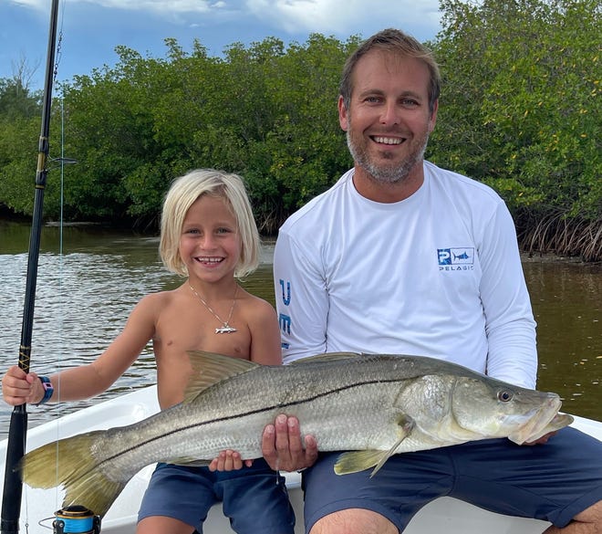 Barrett Morrow, 8, of Jensen Beach caught and released this 38-inch snook and three others while fishing Sept. 9, 2021 in the Indian River Lagoon with dad Blake and live bunker they cast netted.