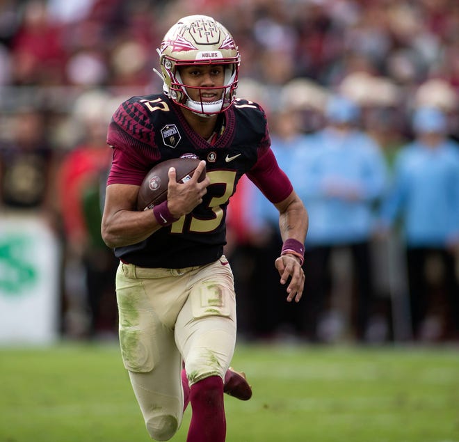 FSU quarterback Jordan Travis, a former Benjamin standout,  scores against Louisiana last Saturday in Tallahassee.