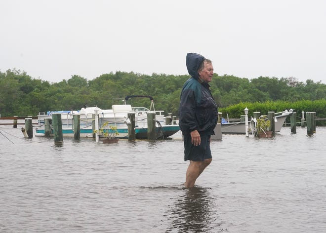 The St. Lucie River floods River Drive in the Riverland Mobile Home Park community, Wednesday, Nov. 9, 2022, in Stuart. Tropical Storm Nicole is expected to approach the Treasure Coast as a Category 1 Hurricane bringing tropical storm force winds to the area as it approaches by early afternoon and “near or above hurricane force” winds overnight, a meteorologist said.