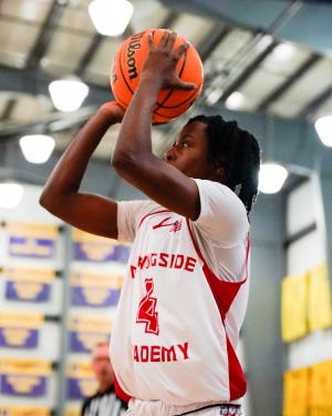 Morningside Academy's Darious Moore Jr. (4) takes a shot against Atlantic Christian in the District 13-2A final Friday, Feb. 11, 2022, at The Pine School in Hobe Sound. Morningside Academy won 50-47.