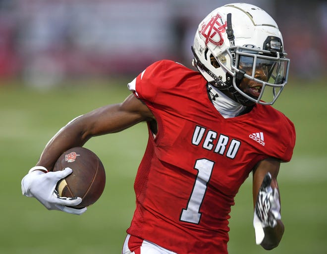 Vero Beach High School's Vandrevius Jacobs  escapes the grip of a South Fork defender as the Vero Beach High School Fighting Indians take on the South Fork Bulldogs on Friday, Aug. 26, 2022, at Billy Livings Field at the Citrus Bow in Vero Beach. Vero Beach won 54-6.