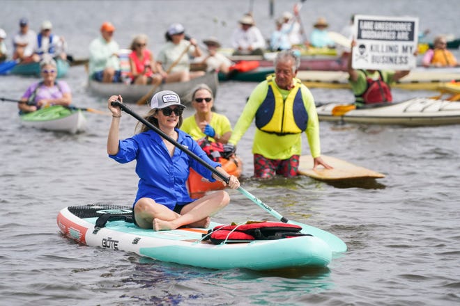 About 100 friends and family of the late environmentalist Maggy Hurchalla honor her life with a public paddle-out ceremony Saturday, March 12, 2022, at Cove Road Park in Port Salerno. Hurchalla, a slow-growth environmentalist and former five-term Martin County commissioner died Feb. 19.  "We are here to celebrate the essence of Maggy," said granddaughter Kym Hurchalla. "I'm so happy to see so many familiar faces today and I know that's what she would have wanted."