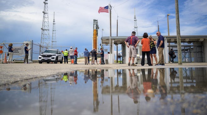 NASA’s Space Launch System (SLS) rocket with the Orion spacecraft aboard is seen atop a mobile launcher at Launch Pad 39B at NASA’s Kennedy Space Center in Florida.