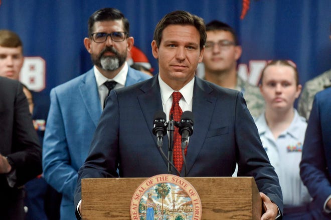 Gov. Ron DeSantis visited Fort Walton Beach High School Tuesday, where he responded to Trump's attacks on him for the first time. The governor was asked Wednesday about a GOP "civil war" and said "people just need to chill out a little bit."