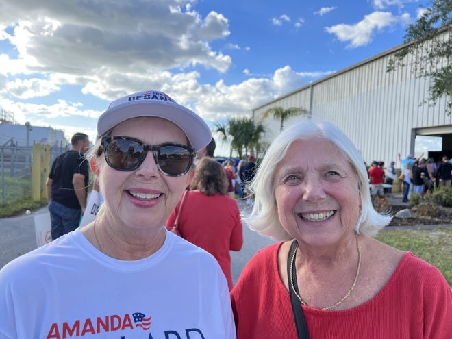 Bradenton sisters Judy Karkhoff, left, and Suzie Lindberg attended Gov. Ron DeSantis' rally in Sarasota on Sunday, Nov. 6, 2022. Lindberg said she is "mad" at former President Donald Trump for attacking DeSantis as "Ron DeSanctimonious."