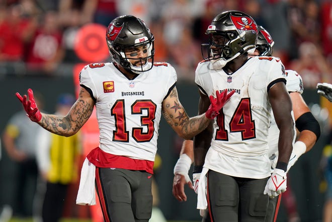 Tampa Bay Buccaneers wide receiver Mike Evans (13) celebrates after a touchdown during the first half of an NFL football game against the Kansas City Chiefs Sunday, Oct. 2, 2022, in Tampa, Fla. (AP Photo/Chris O'Meara)