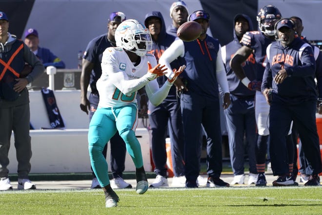 Miami Dolphins wide receiver Tyreek Hill catches a pass during the first half of an NFL football game against the Chicago Bears, Sunday, Nov. 6, 2022 in Chicago. (AP Photo/Charles Rex Arbogast)
