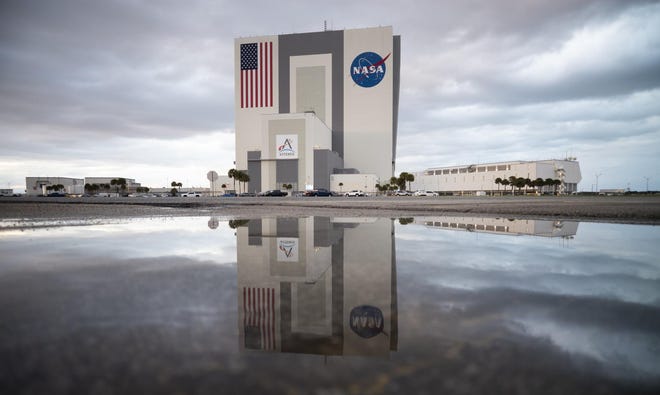 The Vehicle Assembly Building is seen before the rollout of NASA’s Space Launch System (SLS) rocket with the Orion spacecraft aboard atop a mobile launcher from High Bay 3, Wednesday, March 16, 2022, at NASA’s Kennedy Space Center in Florida.