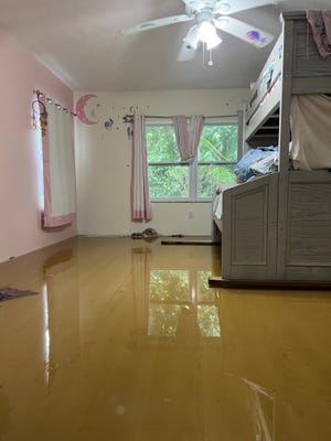 Water from Hurricane Nicole inside a room in Ashley Maytin's home south of the Palm City Bridge, at the east end of Southwest 31st Street in Martin County.