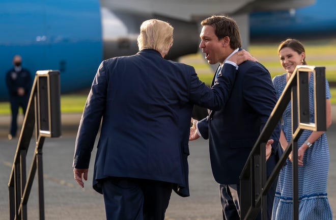 Happier times. Gov. Ron DeSantis and former President Donald Trump at a campaign rally in Ocala in October 2020.