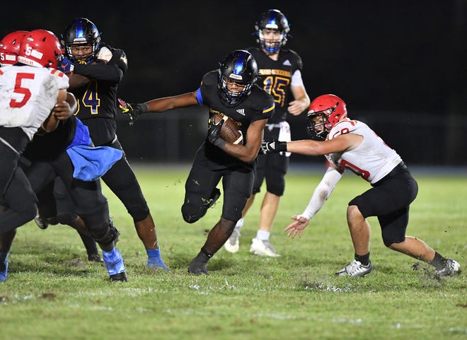 John Carroll Catholic hosts Cardinal Mooney in a Region 3-1S semifinal high school football game, Friday, Nov. 18, 2022, in Fort Pierce.