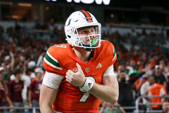 Nov 5, 2022; Miami Gardens, Florida, USA; Miami Hurricanes quarterback Tyler Van Dyke (9) reacts after throwing the football during the second quarter against the Florida State Seminoles at Hard Rock Stadium. Mandatory Credit: Sam Navarro-USA TODAY Sports