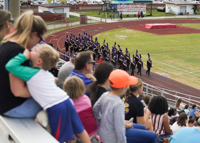 Fort Pierce Central marching band and color guard perform during the 41st annual Crown Jewel Marching Band Festival on Saturday, Oct. 8, 2022, at Vero Beach High School. The Crown Jewel is one of the oldest continuous marching festivals in Florida.