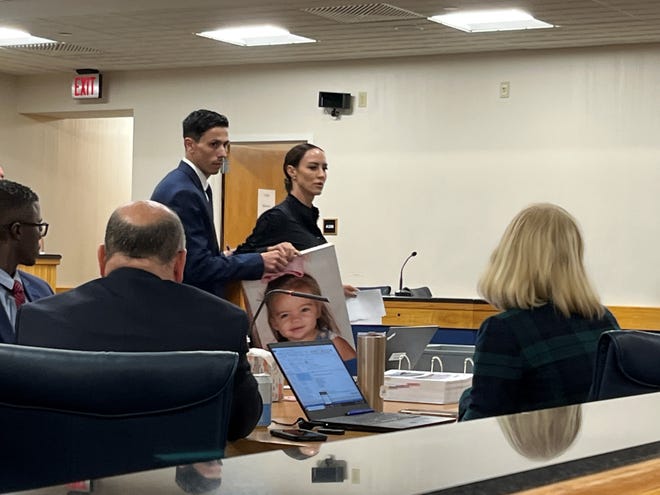 Leanne Matakaetis returns to her seat Nov. 15, 2022 at the Martin County Courthouse, after showing a judge a photo of her deceased daughter Hudson, who died at 20-months-old during a 2019 boat crash caused by Kyle Barrett, who was sentenced to four years in prison.