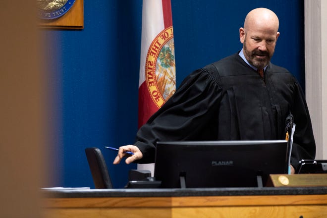 Austin Harrouff, accused of murdering a Tequesta couple in 2016, attends a status hearing in front of Martin County Circuit Judge Sherwood Bauer on Thursday, March 5, 2020, at the Martin County Courthouse in Stuart.