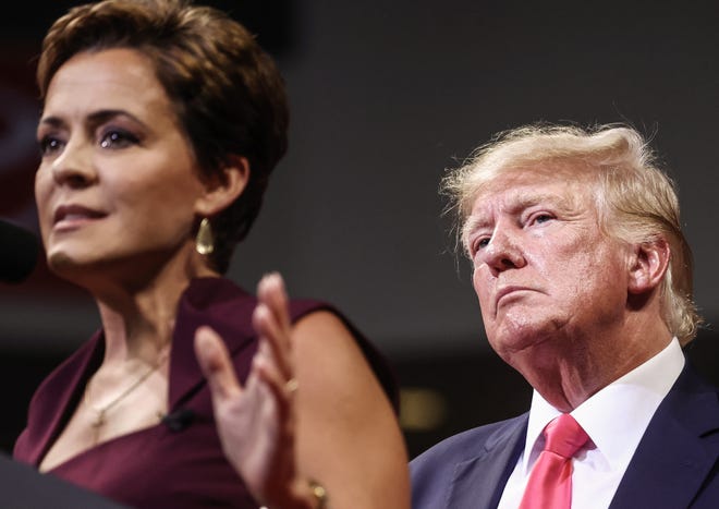 Former President Donald Trump (R) watches Republican candidate for governor Kari Lake speaks at a ‘Save America’ rally in support of Arizona GOP candidates on July 22, 2022, in Prescott Valley, Arizona. Arizona's primary election will take place on Aug. 2.