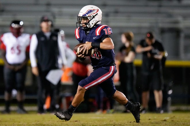 Centennial’s quarterback Danny Riveron (16) runs the ball against Port St. Lucie in a high school football game on Friday, Nov. 4, 2022, at South County Regional Stadium. Centennial won 59-0.