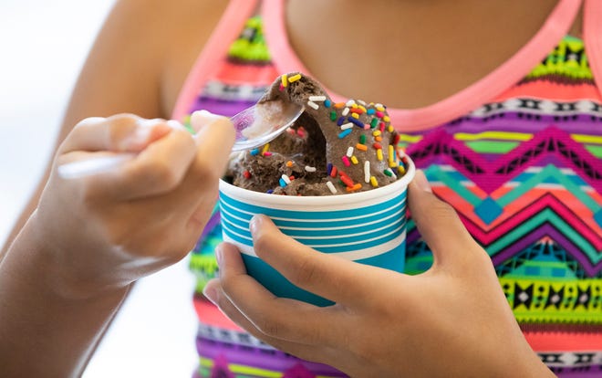 We Be Poppin, which sells homemade fudge, kettle corn, popcorn, taffy, ice cream, lemonade and various other sweets, opened on Sept. 14, 2020, in Fort Pierce. “We had every concern. We are vendors and there was no place to earn money after COVID hit, so we had to do something,” said co-owner, Tim White, not pictured, who owns the business with his girlfriend, Blenda Price. We Be Poppin also has outdoor seating and a to-go window.