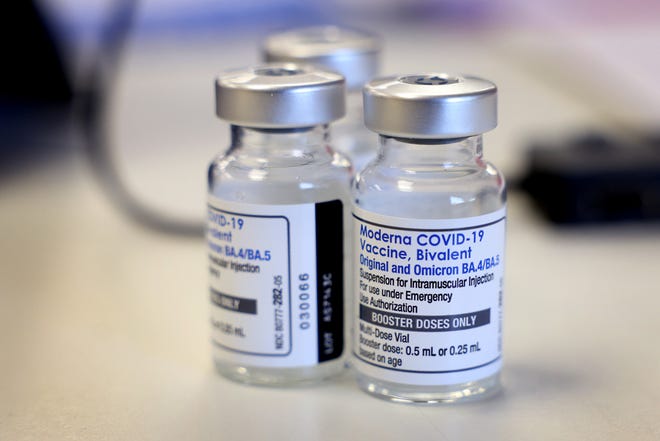 Vials of the updated Moderna COVID-19 vaccine, which protects against the original SARS-CoV-2 virus and the more recent omicron variants, BA.4 and BA.5.
