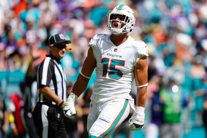 Jaelan Phillips celebrates a tackles against the Vikings.