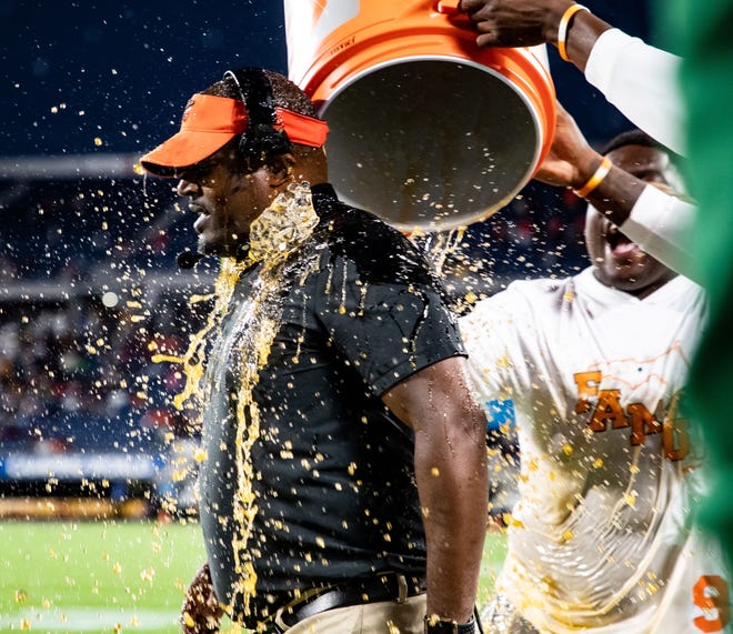 Florida A&M Rattlers dump gatorade on Florida A&M Rattlers head coach Willie Simmons. The FAMU Rattlers defeated the BCU Wildcats 41-20 during the annual Florida Classic at Camping World Stadium on Saturday, Nov. 19, 2022.