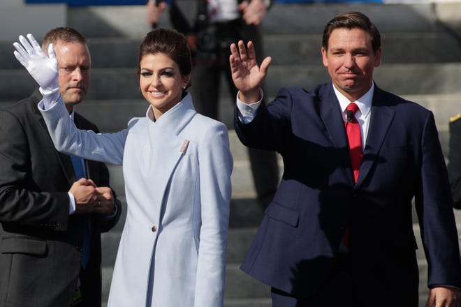Gov. Ron DeSantis and his wife Casey DeSantis wave to the crowd during the 2019 inauguration ceremony on the steps of the Historic Capitol Building in Tallahassee Tuesday, Jan. 8, 2019.