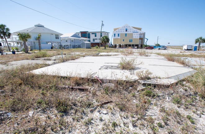 While some houses are under construction or already newly rebuilt, other property destroyed by the 2018 Hurricane Michael remain vacant in Mexico Beach, Florida on Monday, Oct. 10, 2022. Many of the buildings throughout the area were destroyed when Hurricane Michael hit in October 2018.