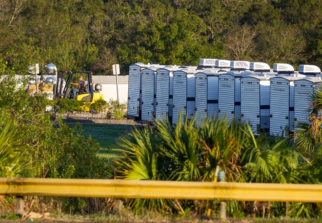 A row of travel trailers is seen inside the perimeter of the former Fort Pierce Jai Alai Fronton on Thursday, Dec. 8, 2022 in Fort Pierce. Staff working under FEMA are using the site as a staging area stocked with travel trailers to help families displaced from hurricanes Ian and Nicole.