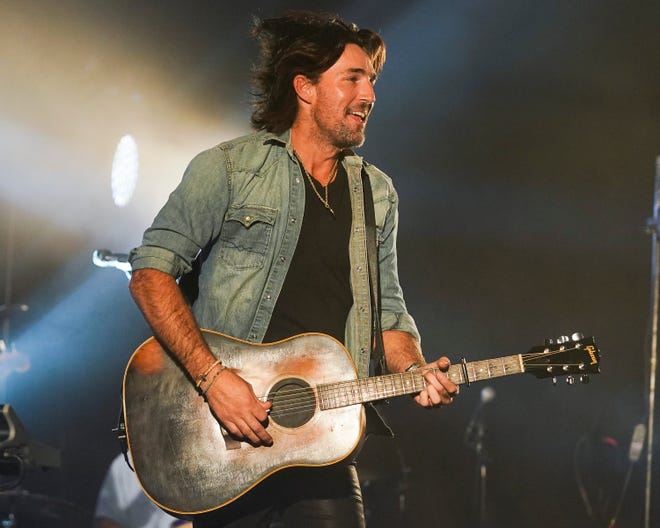 Jake Owen performs for the crowd during his annual hometown concert benefiting the Jake Owen Foundation Saturday, Oct. 9, 2021, at the Corporate Air Hanger at the Vero Beach Regional Airport.