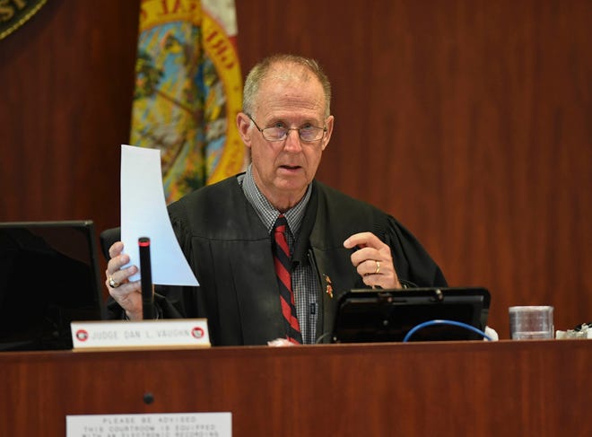 Activity in the courtroom is seen as Indian River County Circuit Judge Dan Vaughn sentences Andrew "A.J." Coffee IV, in the Indian River County Courthouse on Feb. 14, 2022 in Vero Beach. Coffee was sentenced to 10 years, less time served, for one count of felon in possession of a firearm related to the March 19, 2017 drug raid fire fight with Indian River County Sheriffâ€™s Office SWAT team members that left his girlfriend Alteria Woods, 21, dead from gunfire shot by deputies.