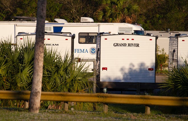 A FEMA motorhome is seen parked inside the grounds of the former Fort Pierce jai alai fronton on Thursday, Dec. 8, 2022, in Fort Pierce. The site is being used as a FEMA staging area, with a stockpile of travel trailers to be dispatched to help families displaced by hurricanes Ian and Nicole.