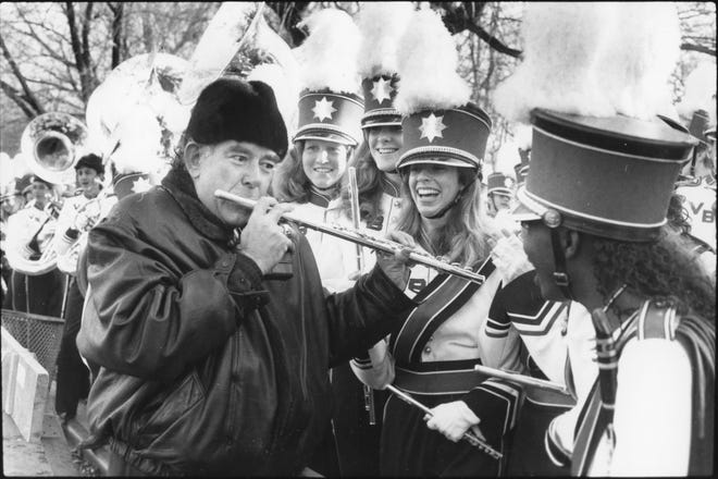 November 24, 1988 - Entertainer Robin Leach got smiles from members of the Vero Beach High School Marching Band, which performed in its first Macy's Thanksgiving Day Parade under the direction of James and Sheila Sammons.
