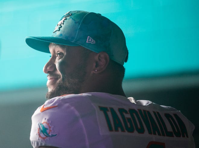 Dolphins quarterback Tua Tagovailoa smiles in the Hard Rock Stadium tunnel prior to the start of last Sunday's game with the Texans.