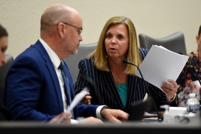 Indian River County school board member Teri Barenborg discusses the agenda with superintendent David Moore on Monday, Feb. 28, 2022, during a school board meeting. The board heard comment from the public on the proposed removing of certain books from all school libraries.