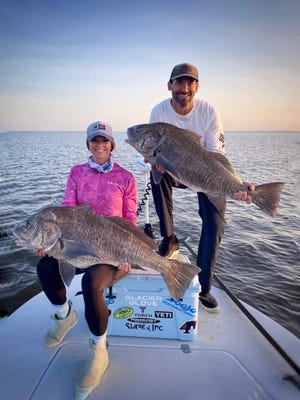 Black drum were biting for these two with Capt. Jon Lulay on 2 Castaway charters in Titusville.