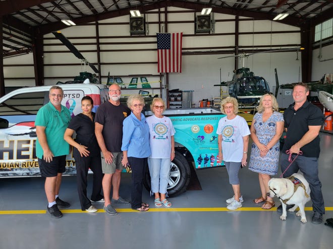 Members and sponsors from local healthcare and veterans' groups including Next Generation Veterans of Indian River County, American Gold Star Mothers of Indian River County, Dogs For Life, Emerald Medical and the Mental Health Association in Indian River County at the unveiling of the IRCSO PTSD awareness truck wrap on Nov. 1, 2022.